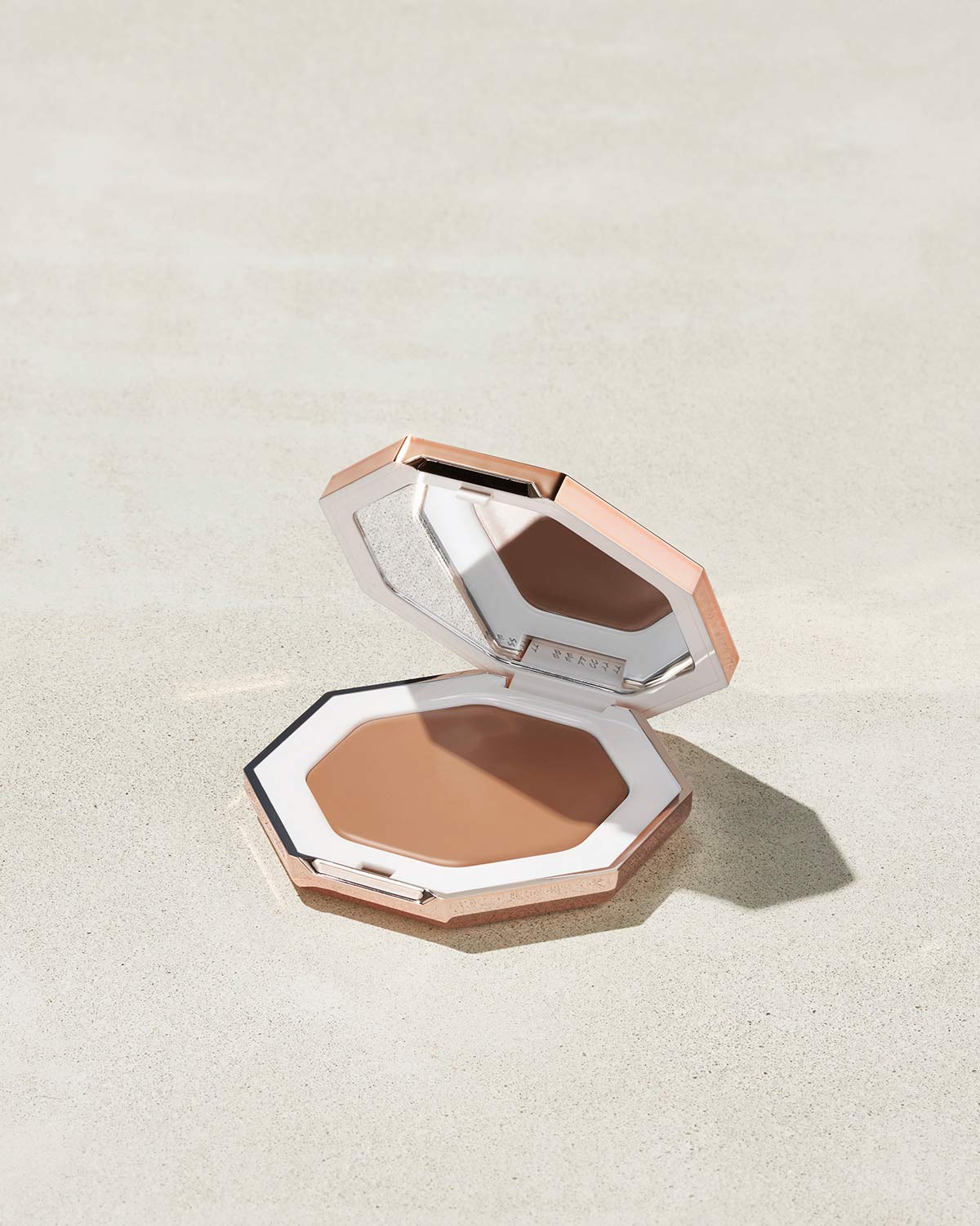 7. Fenty Beauty Cheeks Out Freestyle Cream Bronzer