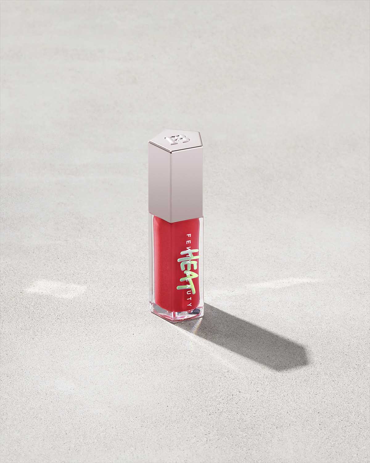 3. Fenty Beauty Gloss Bomb Heat Universal Lip Luminizer + Plumper